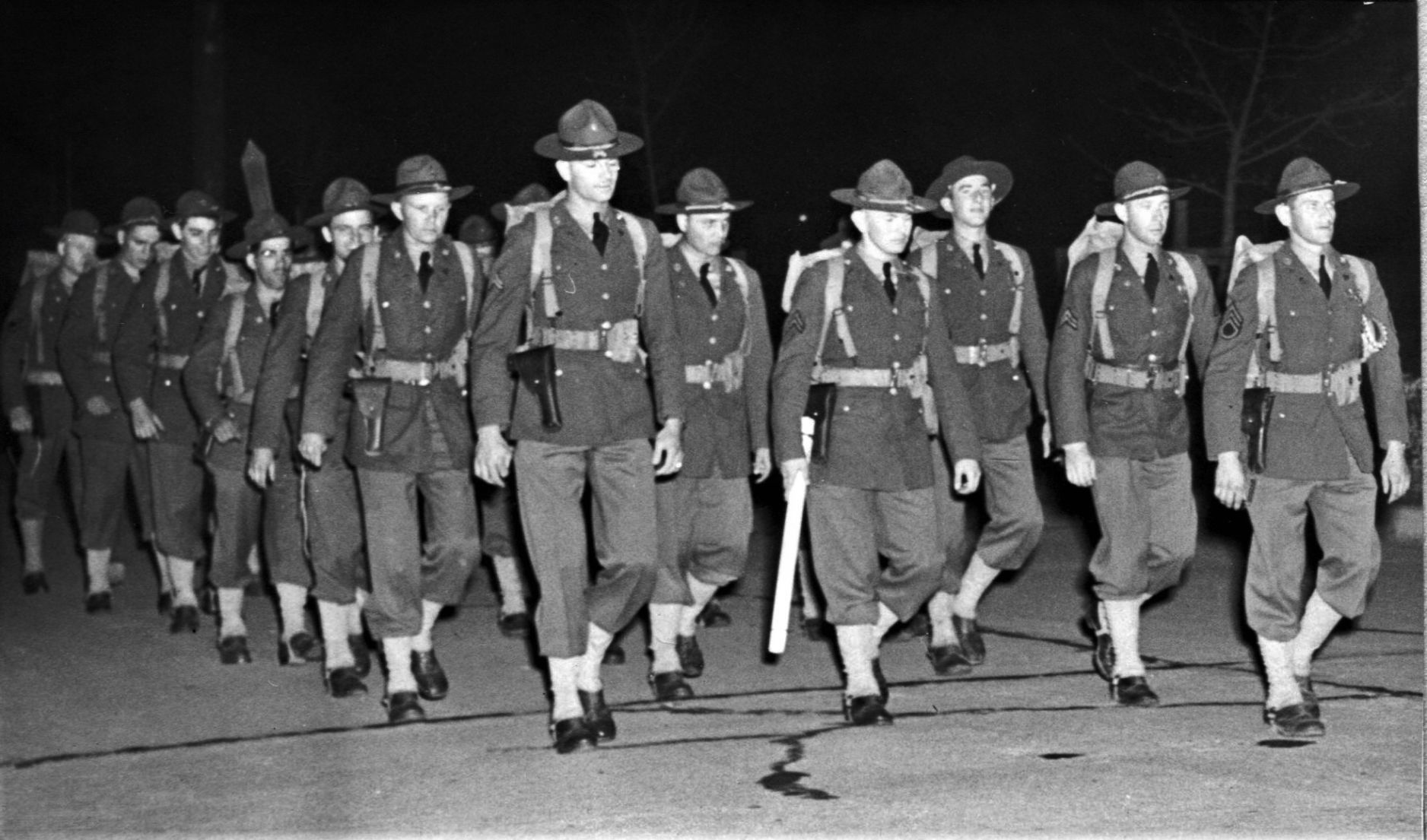 Guardsmen march to train station